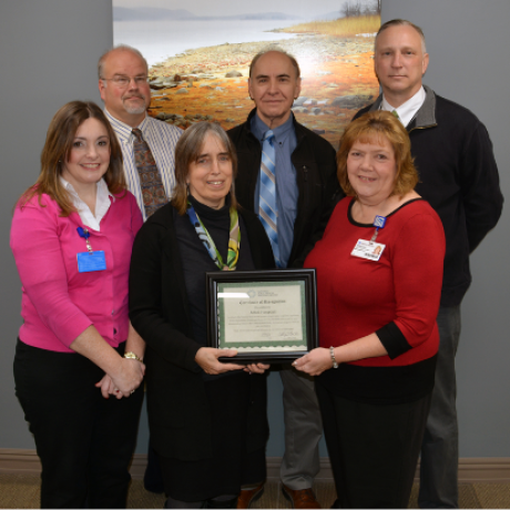 Athol Hospital leaders and community stakeholders accept CAH Recognition Certificate.