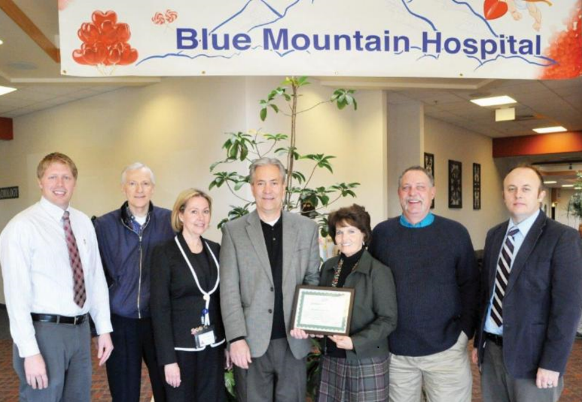 Hospital executives receive CAH Recognition certificate from Utah Flex officers