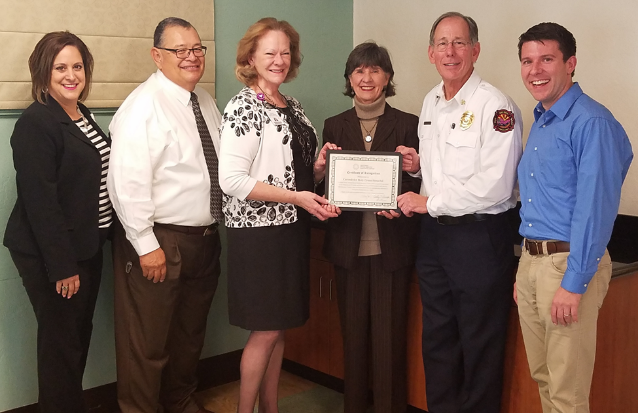 Executives and staff from Carondolet Holy Cross Hospital accept CAH Recognition award from Arizona Flex Program officer