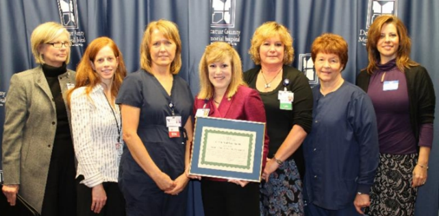 Staff and executives at Decatur Memorial Hospital receive CAH Recognition certificate from the Indiana State Flex Program