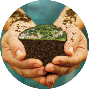 Cupped together hands holding a rural community.