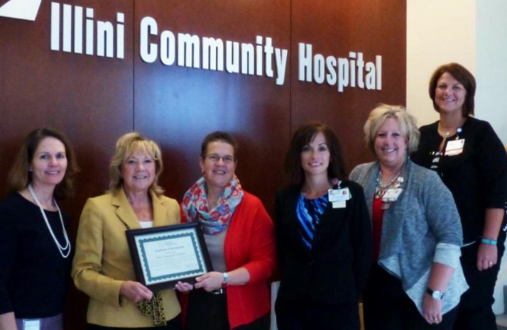 ICH leaders receive CAH Recognition certificate from Illinois Flex officers