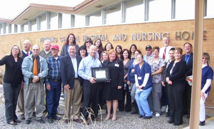 The Nevada Flex Program presents CAH Recognition Certificate to hospital CEO and staff