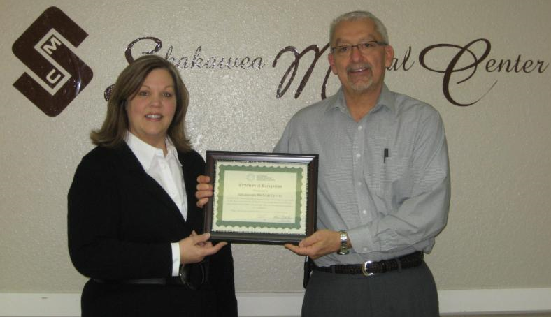 Sakakawea Medical Center CEO accepts CAH Recognition Certificate from North Dakota Flex Program officer