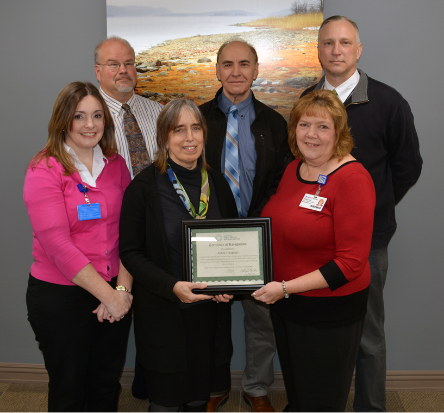 Athol Hospital leaders and community stakeholders accept CAH Recognition Certificate.