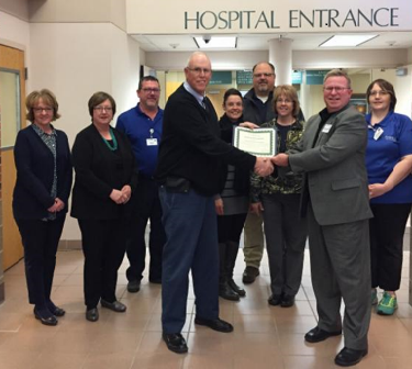 Avera Holy Family Hospital and partners accept CAH Recognition Certificate from the Iowa Flex Program