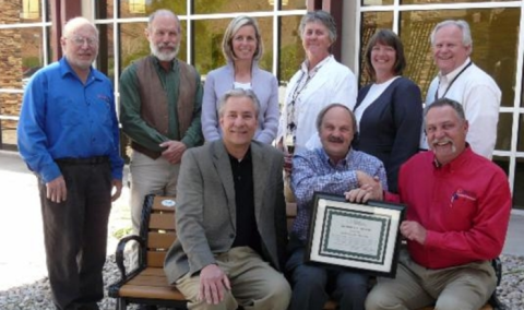 Utah Flex Program staff, Greg Rosenvall and Don Wood, present the certificate to Robb Austin, Mike Bynum, Jaylyn Hawks, Bob Jones, Dr. Kathy Williams, Craig Daniels and Vicki Gigliotti