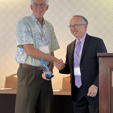 Scott Daniels accepting 2023 Calico Award