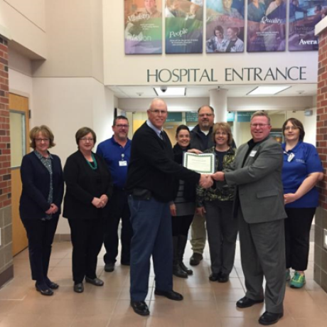 Avera Holy Family Hospital and partners accept CAH Recognition Certificate from Iowa Flex Program officers