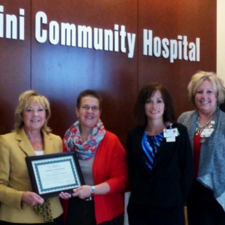 ICH leaders receive CAH Recognition certificate from Illinois Flex officers