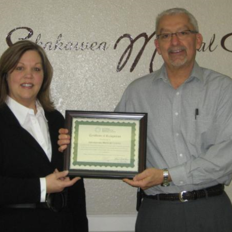 Sakakawea Medical Center CEO accepts CAH Recognition Certificate from North Dakota Flex Program officer